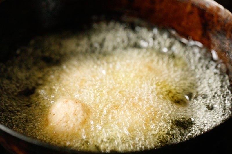 malai kofta balls frying in hot oil