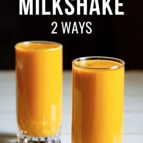 mango milkshake in two tall glasses on white table with a black background and text layovers