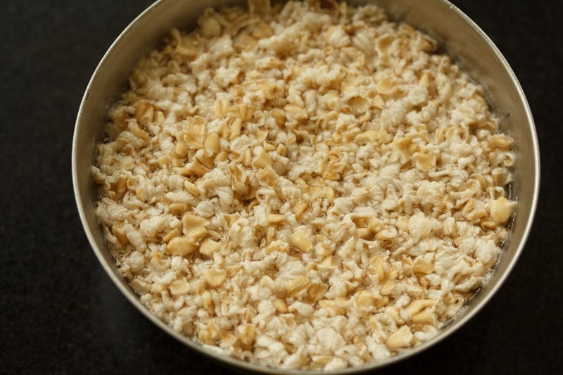 soaked oats in steel bowl