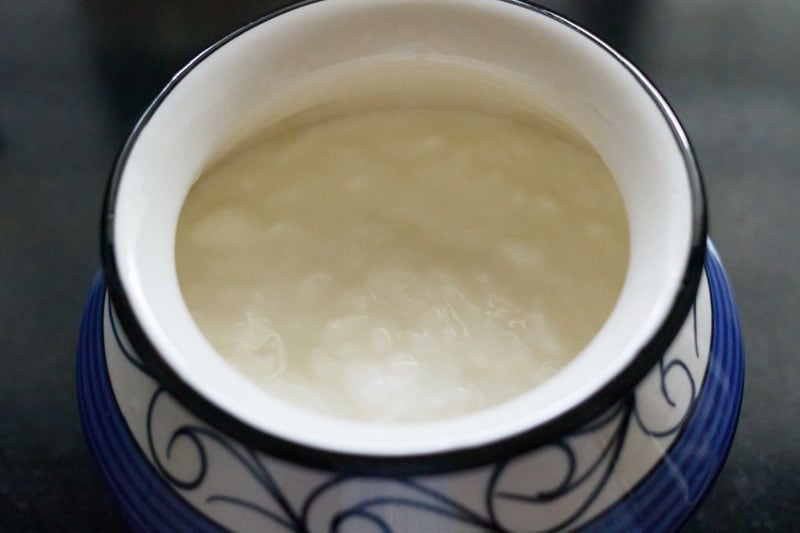 yogurt in a white and blue designed ceramic pan