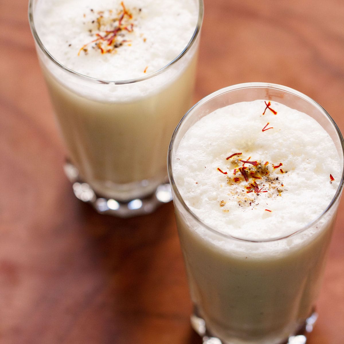 Top shot of two glasses filled with lassi