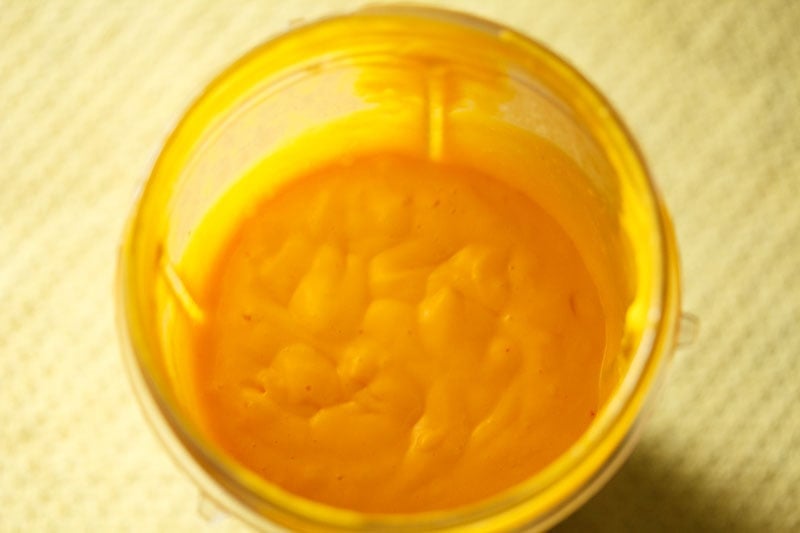 vegan mango milkshake blended smooth in blender