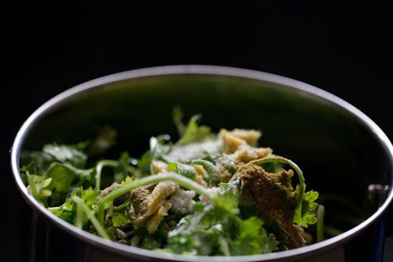 coriander, ground spices, ginger, salt, green chillies in a blender