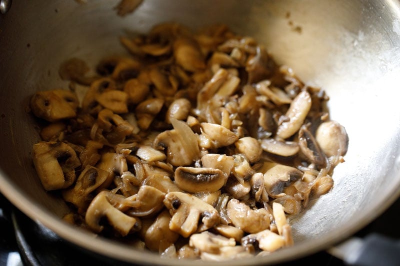 mushrooms in pan after water has evaporated away