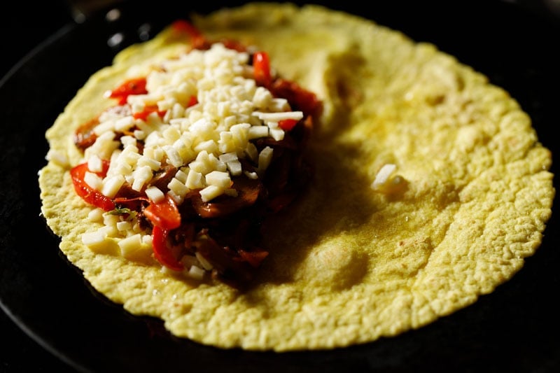 cheese on top of the veggie filling