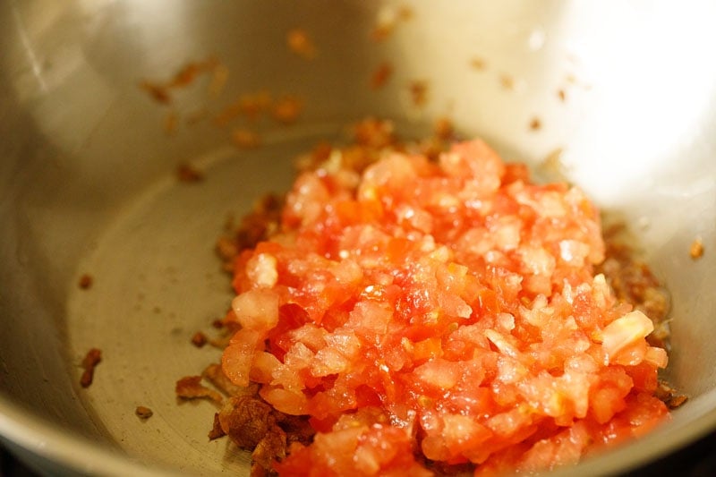 tomatoes added to pan