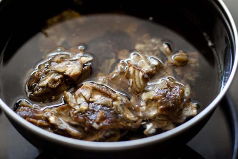 dried tamarind and dates in water