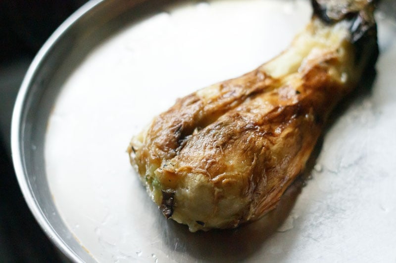 eggplant after charcoal smoking it on the steel plate