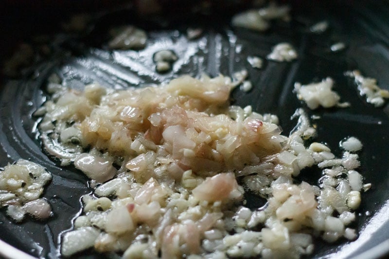 onions being sautéed to make baingan bharta