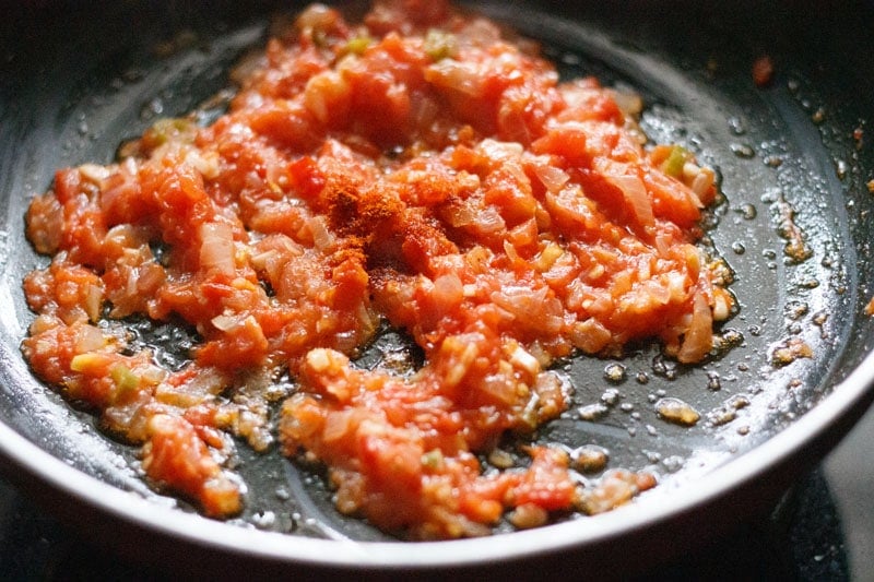 red chilli powder sprinkled on the softened tomatoes