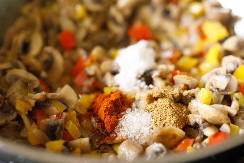 spices added to veggie burrito filling mixture