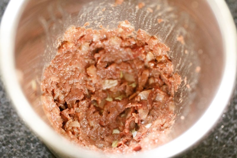 olives and garlic mashed into a paste for making vegetarian caesar salad dressing