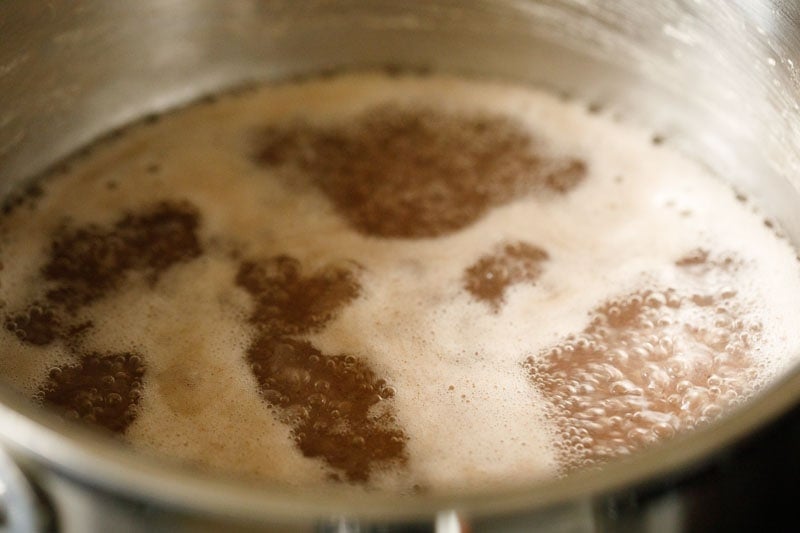 boiling slurry with some foam gathering at the top