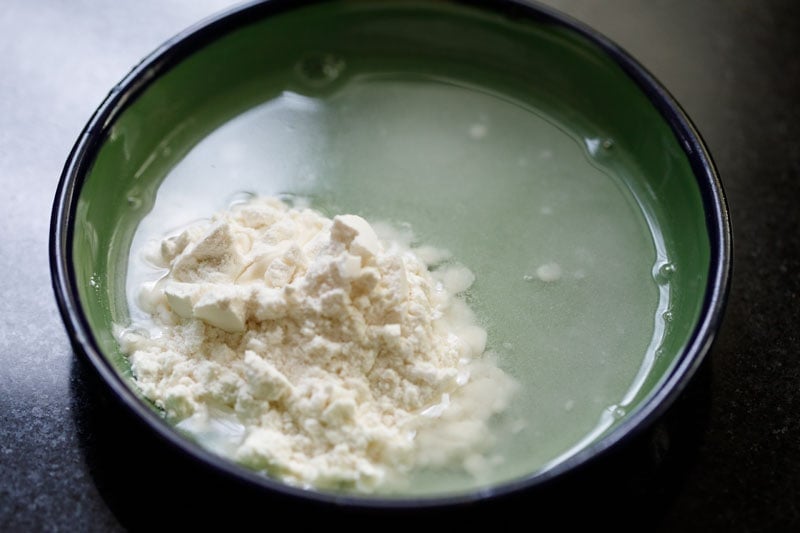 all-purpose flour with water in a bowl