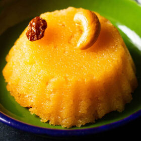 closeup shot of kesari served in dark green plate