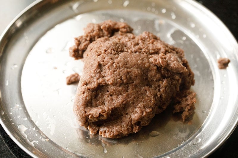 ragi mudde dough after being rolled into a loose ball for kneading