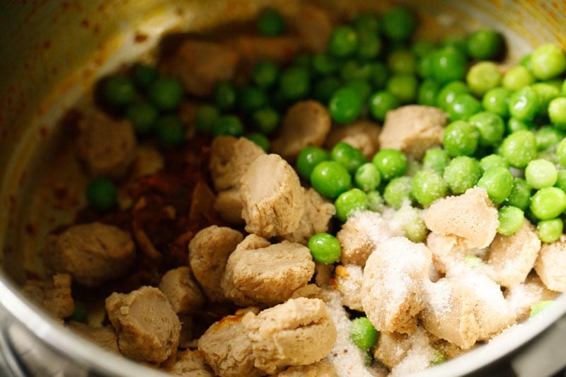 peas, salt and soya chunks added to pot