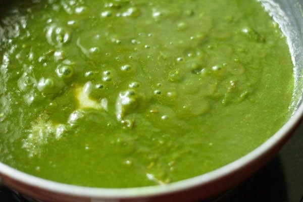 simmering palak gravy or spinach sauce