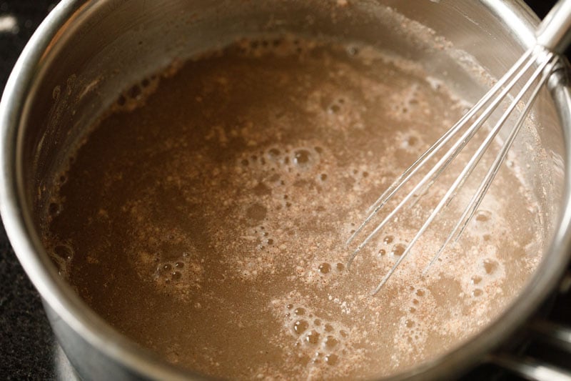 whisk mixing flour and water