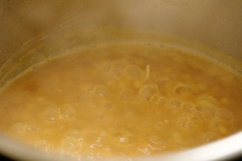 simmering the cooked ragda curry