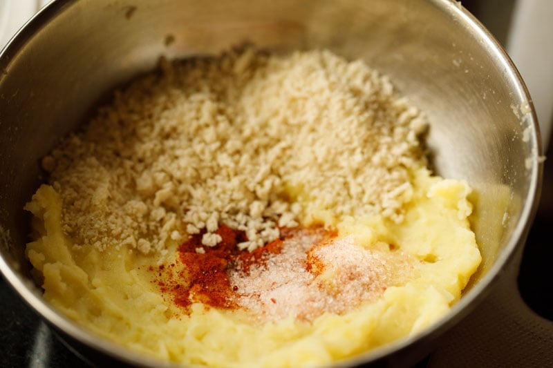 chilli powder salt and bread crumbs added to mashed potatoes