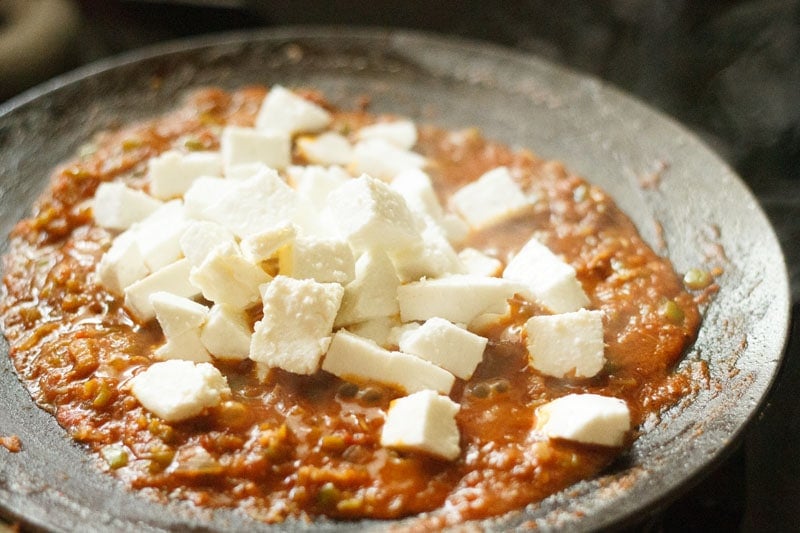 paneer cubes in the sautéed masala on the tawa