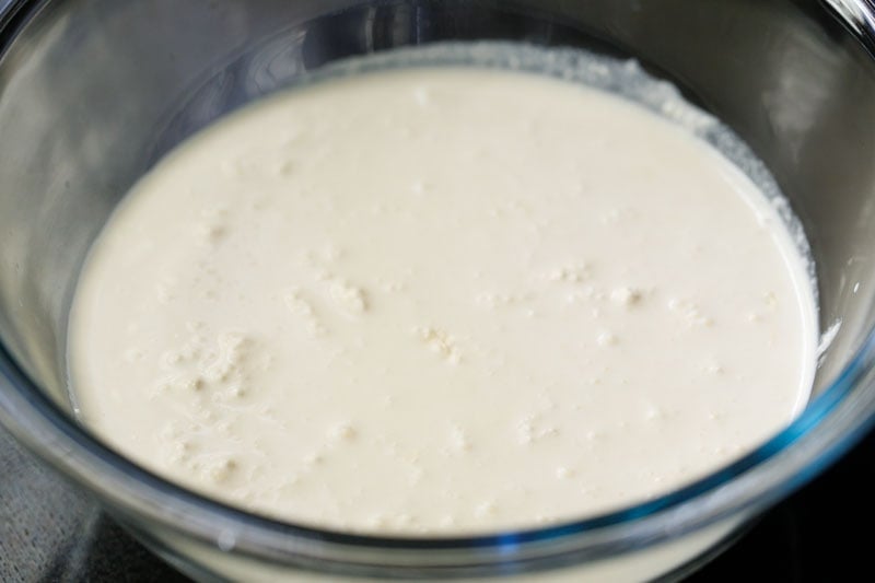 fresh heavy cream in a mixing bowl