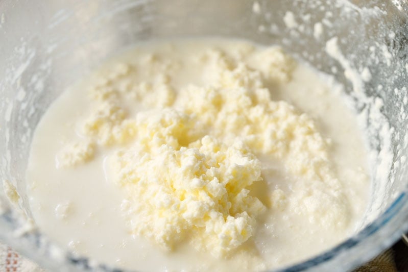 butter separated from whey in mixing bowl