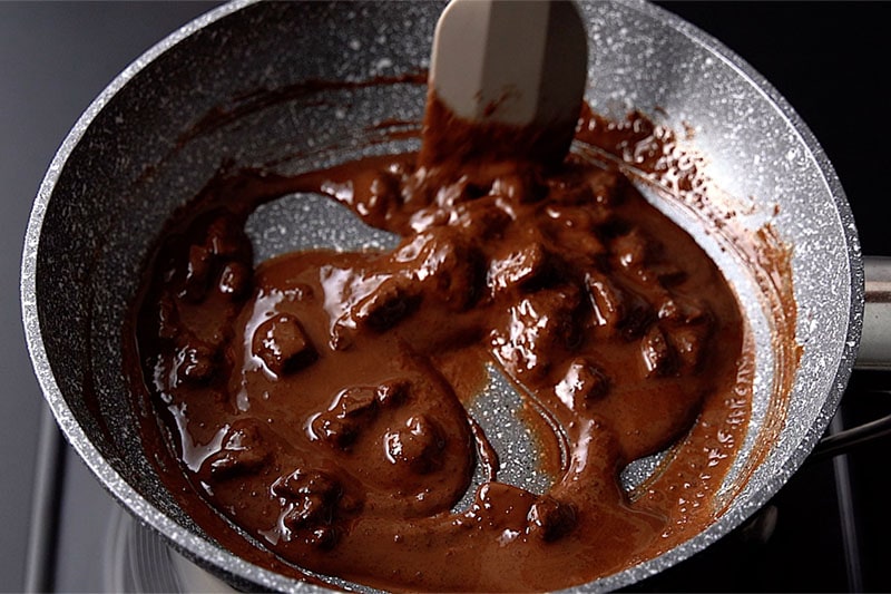 chocolate ingredients being melted and stirred