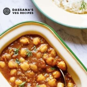 overhead shot of instant pot chana masala in a rectangular shaped bowl with text layovers