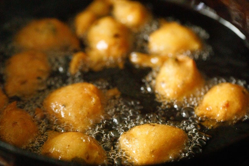 golden fried mysore bonda in hot oil