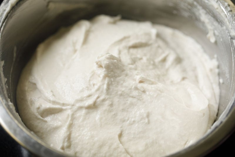 fluffy lentil batter in bowl after whisking