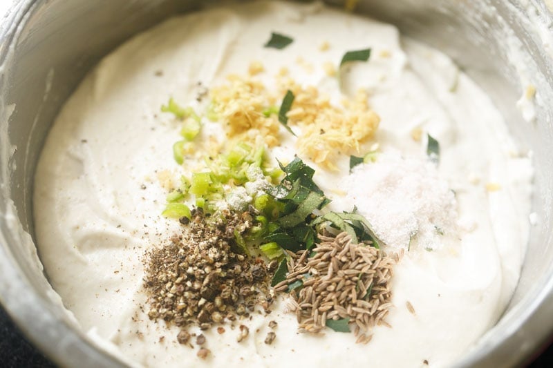 spices and herbs added to lentil batter