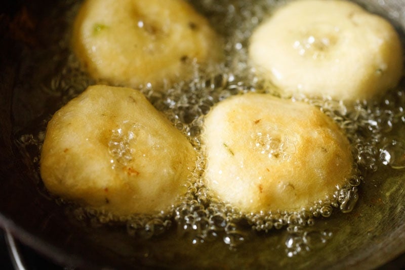 medu vada getting fried in oil