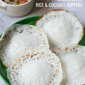 top shot of four appam on green plate with text layovers