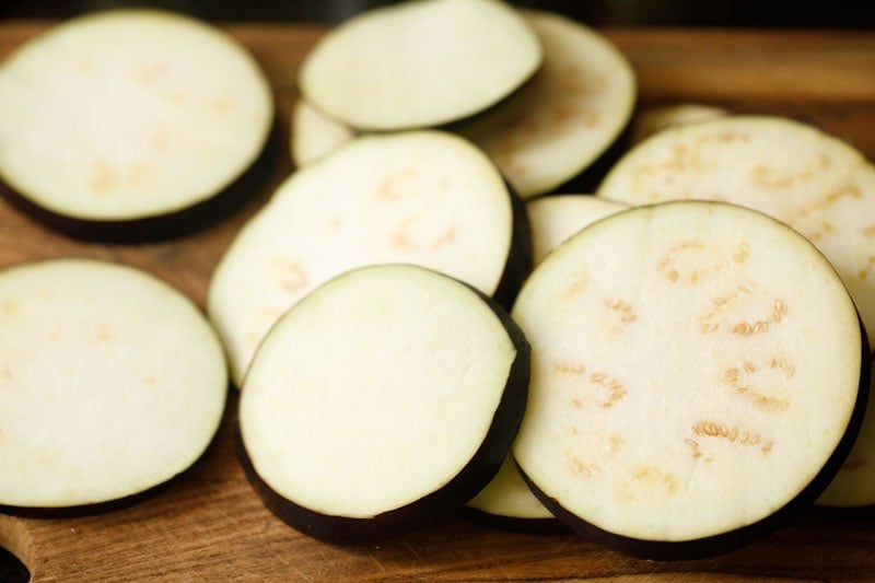 eggplant slices on a wooden board