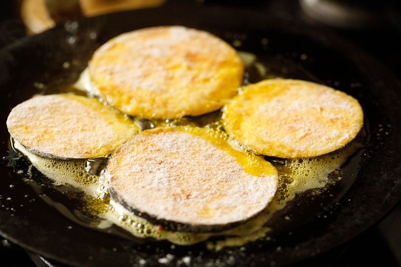 pan frying aubergine or eggplant slices