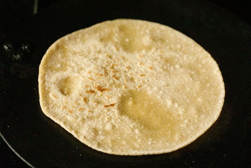 flipped chapati on tawa