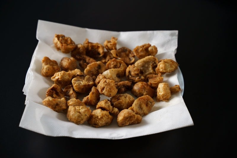 fried mushrooms on paper towels