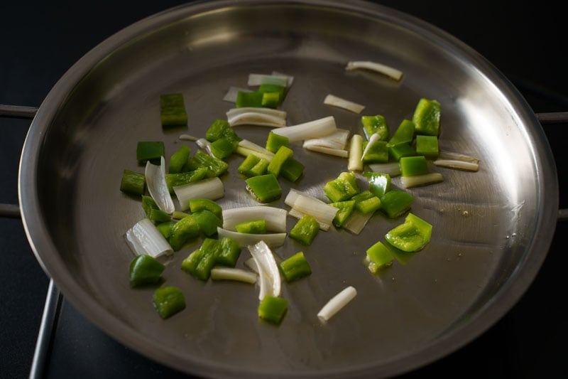 capsicum and scallion white on skillet