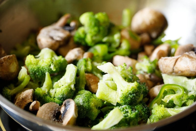 mushrooms and broccoli added to mix