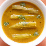 drumstick sambar in white bowl