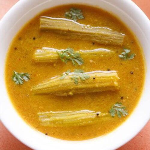 drumstick sambar in white bowl