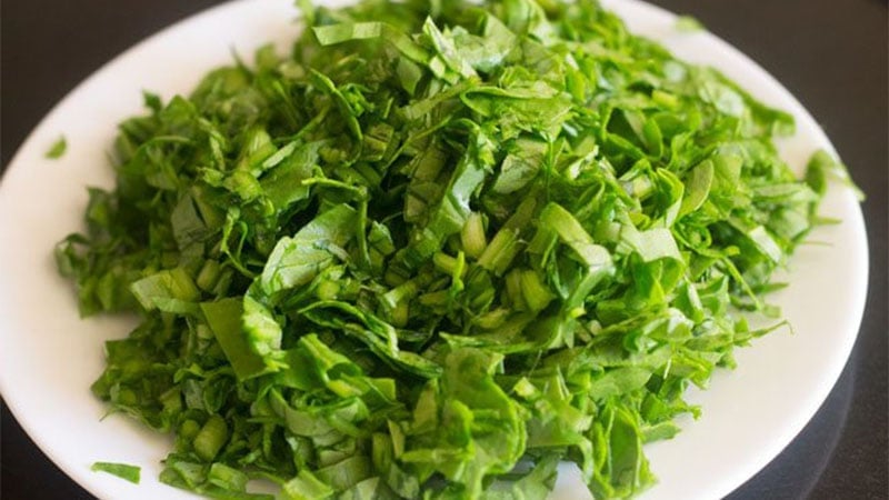 chopped spinach on white plate