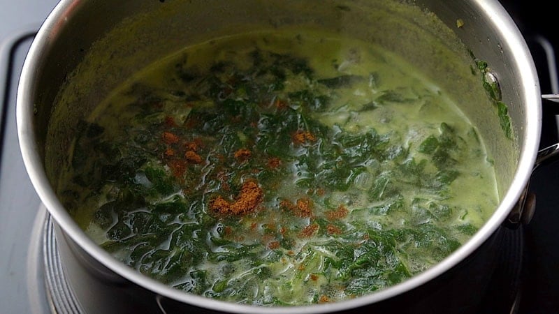 ground cumin added to spinach soup