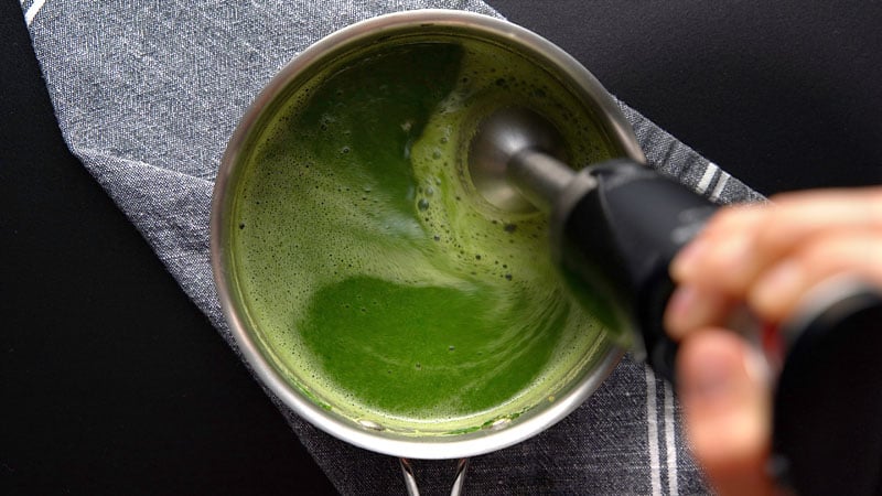 blending soup with an immersion blender