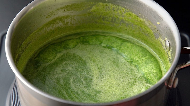 blended smooth palak soup simmering