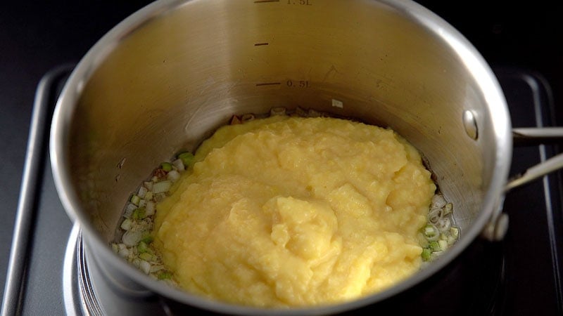corn paste added to the pan