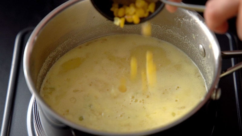 corn kernels being added