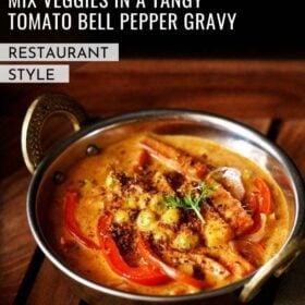 veg kadai gravy in a metal kadai with a sprig of coriander and three red bell pepper slices as garnish with text layovers